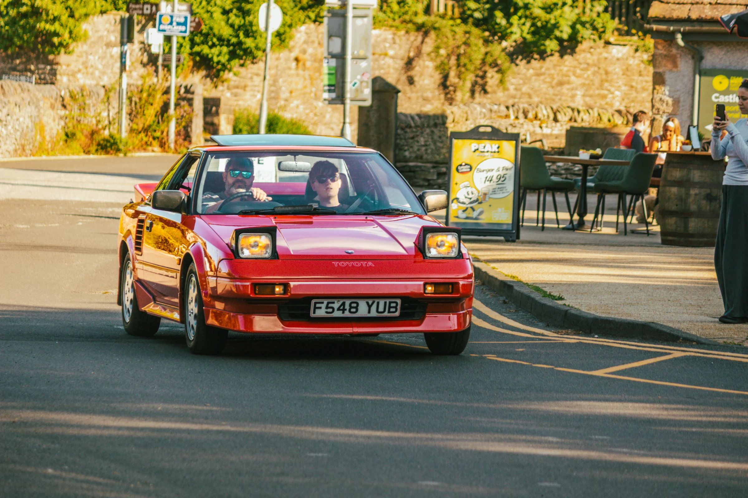 Sports car arriving at Peak Motor Club at Castleton Kitchen / Castleton Visitors Centre / Peak Burger Co.