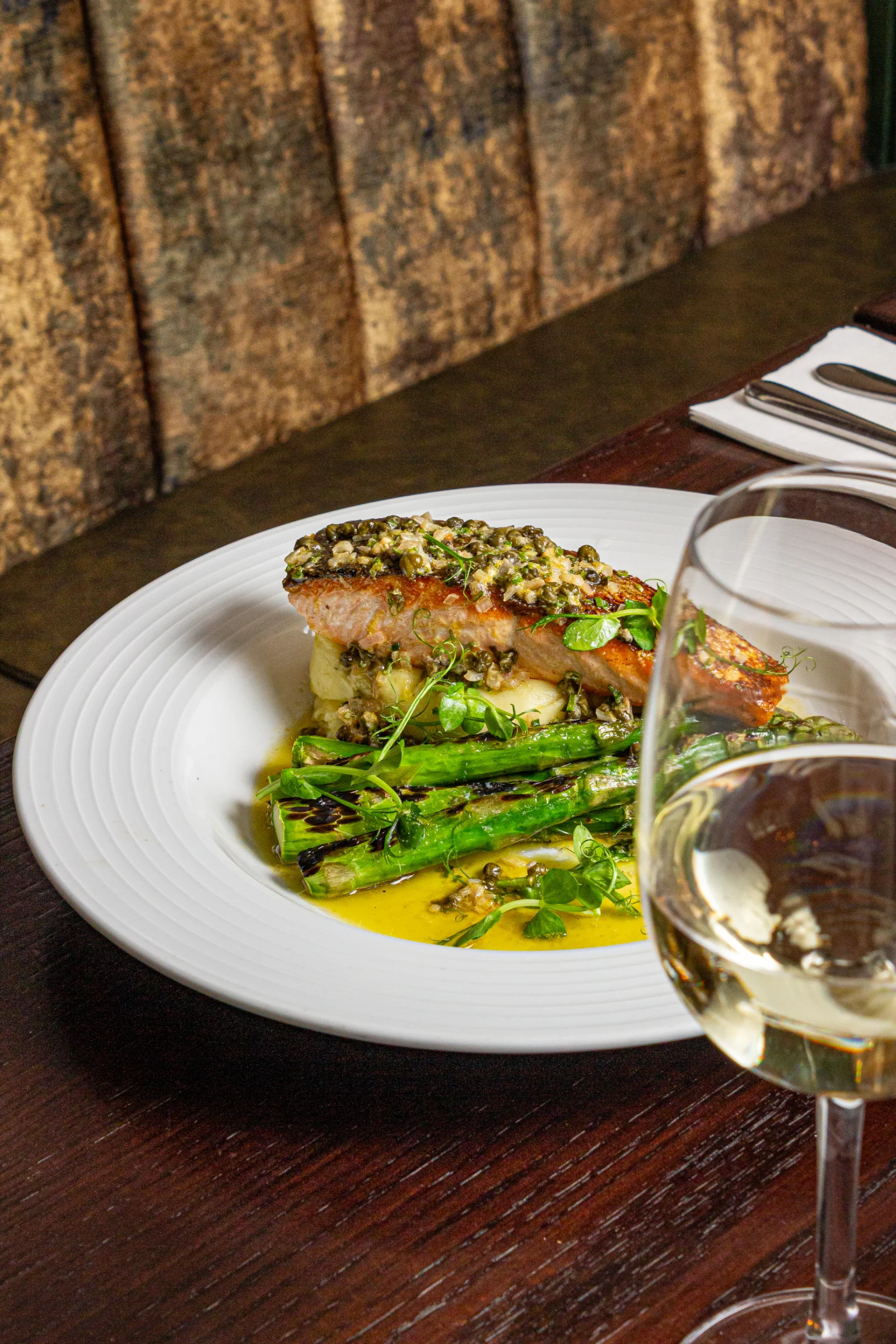 Salmon, mash potato and asparagus dish at The Dore Bar and Grill