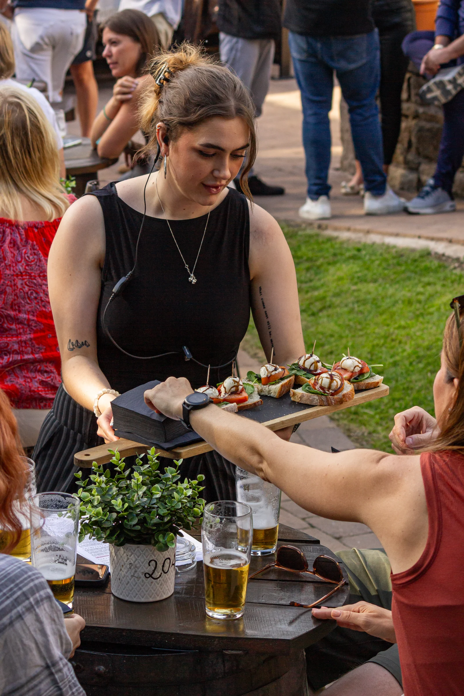 Wine and charcuterie in the courtyard at Vintners on the Brook