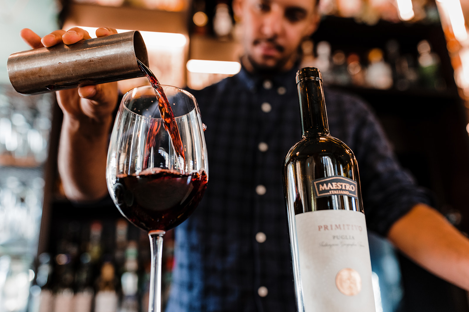 Bar Staff pouring wine
